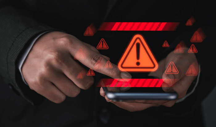 A shield with a lock symbolizing protection against cyberattacks. Safeguard your business with cybersecurity measures.